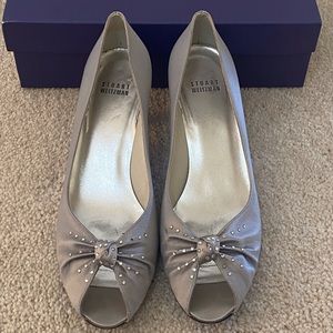 Size 8 1/2, Silver, Stuart Weitzman peek toe pumps. Heel size 1 1/2”.